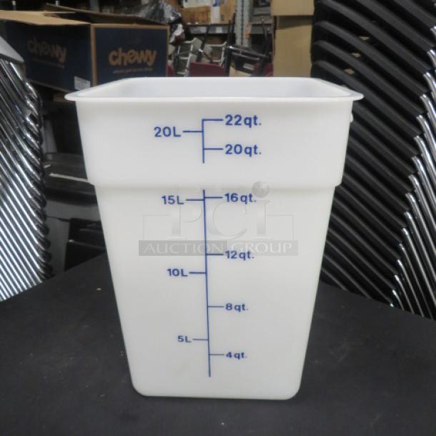 22-quart white food storage container, marked with volume measurements in quarts and liters, in good condition.