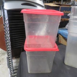 8-quart clear food storage containers with red lids, stackable design, used condition, marked "2XBID".