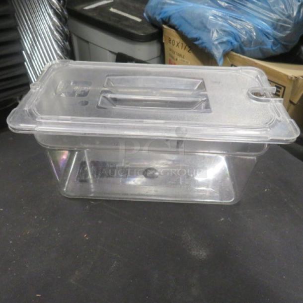 Clear 1/3 size, 6-inch deep food storage container with lid. Used condition, transparent plastic, ideal for kitchen storage.