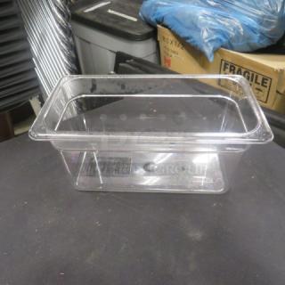 Clear 1/3 size, 6-inch deep food storage container in good condition. Features durable plastic construction, ideal for kitchen use.