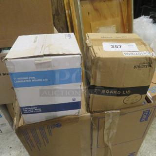 7-inch round foil lids in original packaging; boxes show "Laminated Board Lid," indicating contents for sealing use.