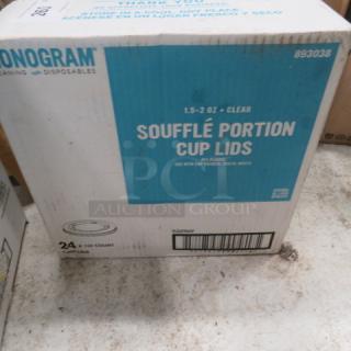 Box of Monogram Soufflé Portion Cup Lids, 1.5-2 oz, 2400 count. Clear plastic, new condition.