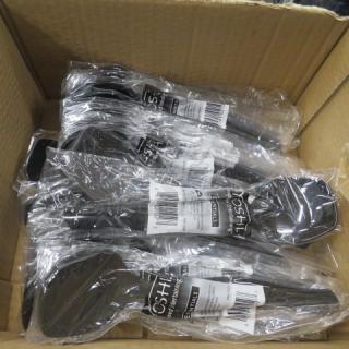 Box of Yoshi serving spoons, individually wrapped, black plastic, new condition, visible packaging labels showing brand.