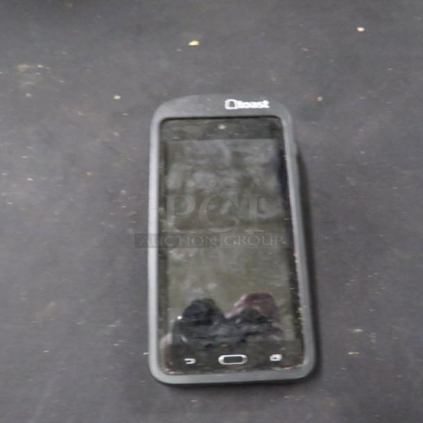 Toast Go 1 handheld POS terminal, model TG100. Used condition with visible screen wear, branded top bezel.