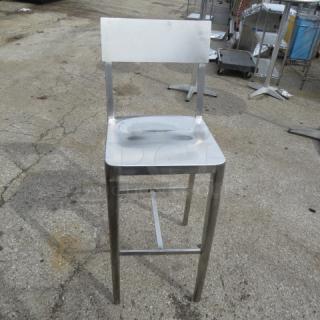 Stainless steel bar height chair with a minimalist design, silver finish, and squared legs. Good condition.