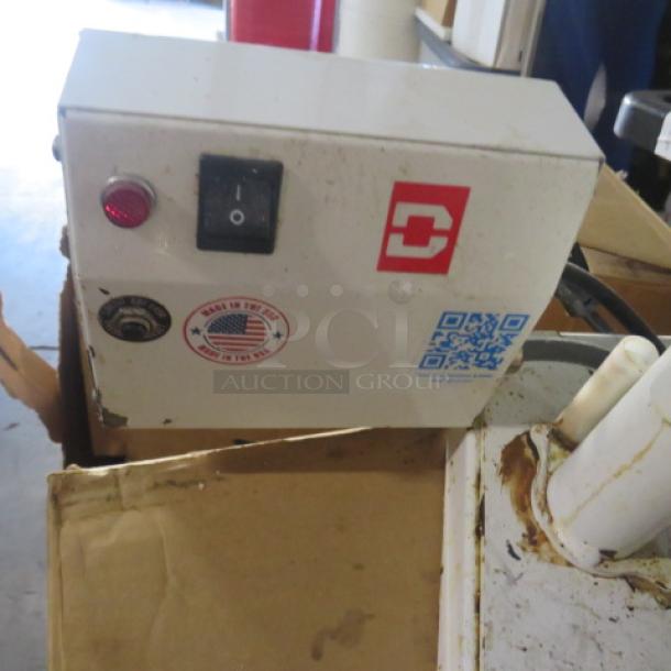 Dough Express Dough Press TXM-15. 3100 Watt, 220 Volt, 1 Phase. Features on/off switch, logo, and QR code. Used condition.