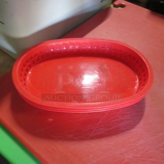 Red fast food basket, 10.5x7.5 inches, shown alone. Part of a lot of 50, in good condition, perfect for serving.