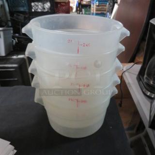 Stack of 2 Quart Round Food Storage Containers, clear plastic, with red measurement markings. Used condition.