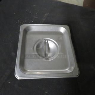 1/6 Size Hotel Lid, model 5XBID, stainless steel, minor wear, sturdy handle, excellent for food storage.