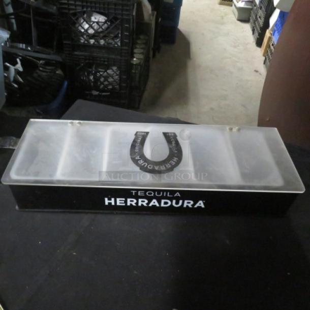 Herradura Tequila domed bar center, black with transparent lid, horseshoe logo, used condition, for bartending or display.