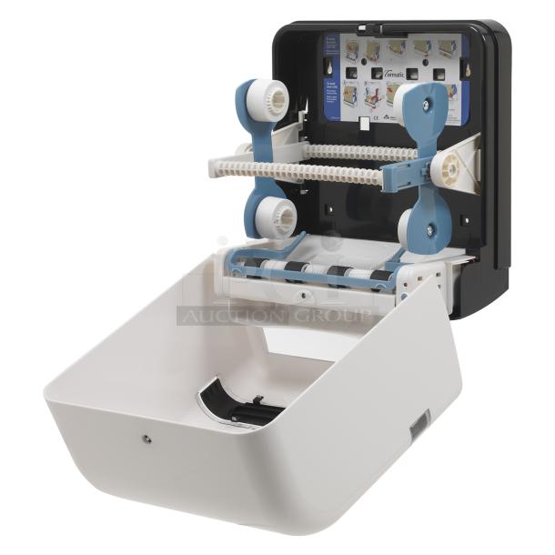 Brand new Georgia Pacific Cormatic ADS200K touchless paper towel dispenser in box, motion-activated, ideal for commercial use.