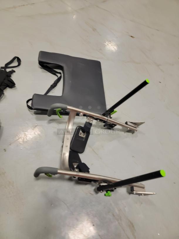 Quickie IRIS wheelchair frame with JAY contoured backrest and elevating leg rests, shown disassembled, excellent condition.