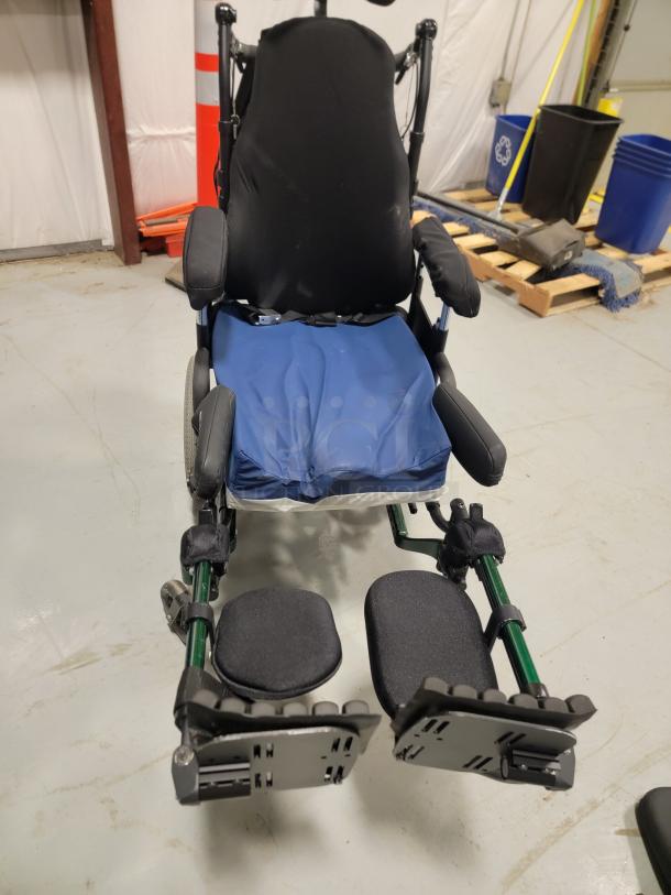 Quickie IRIS Tilt-in-Space Wheelchair with JAY backrest, pressure-relief cushion, and elevating leg rests, excellent condition.