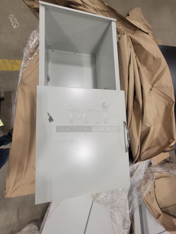 White metal storage pedestal with open front, featuring a silver handle and lock, part of 2023 AIS Matrix system. Like new.