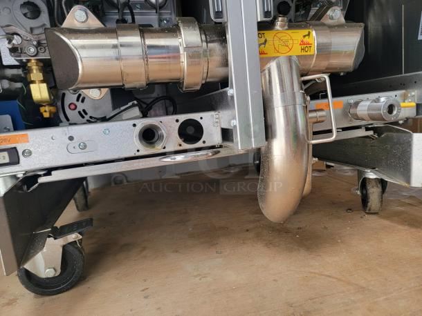 Brand new Pitco Ultrafryer UG14 dual vat fryer, features stainless steel build, with factory tags and protective film.