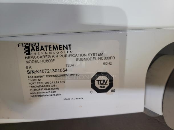 Abatement Technologies HC800FUV air purifier label showing model, serial number, and certification details.