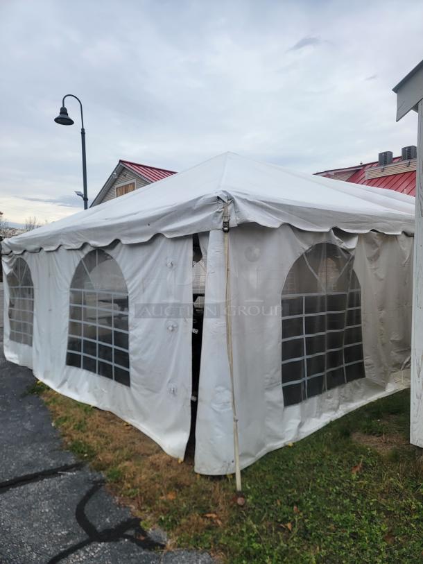 20'x40' commercial-grade Tent and Table BT-FW24WT3P frame tent, white vinyl top, with block-out sidewall kit, in good condition.