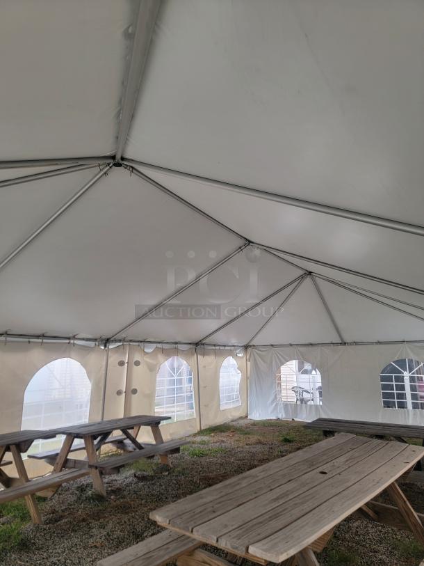 20'x40' Premium West Coast Frame Tent by Tent and Table, model BT-FW24WT3P. Includes aluminum frame, sectional white vinyl top, and block-out sidewall kit.