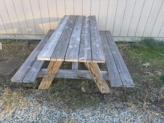 Heavy-duty 8' picnic table, A-frame design, natural patina, extremely sturdy, ideal for gatherings or BBQs.