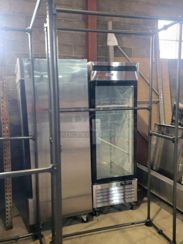 Industrial Pipeline Wall Display by Display Solutions, model Pipeline, in anthracite grey. Heavy-duty, sleek condition, ideal for upscale retail or restaurant use.