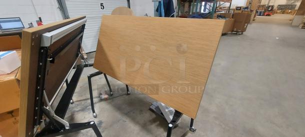 Steelcase flip-top training table, wood laminate, foldable, locking casters, model THWFRL3060NA2K6S4K, excellent condition.