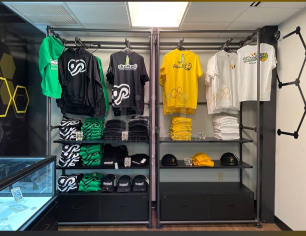 Industrial Pipeline Wall Display by Display Solutions in anthracite grey, showcasing clothing and accessories. Sleek and durable.