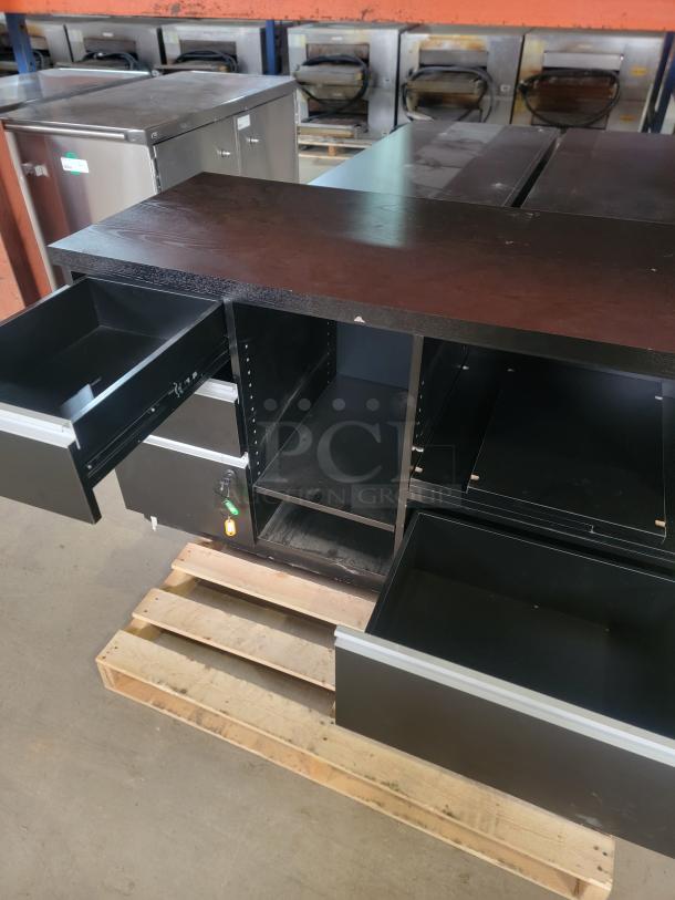 Black Premium Cash Wrap with wood-grain finish, open storage, and smooth-glide drawers, by Premium Retail Fixtures, model 55".