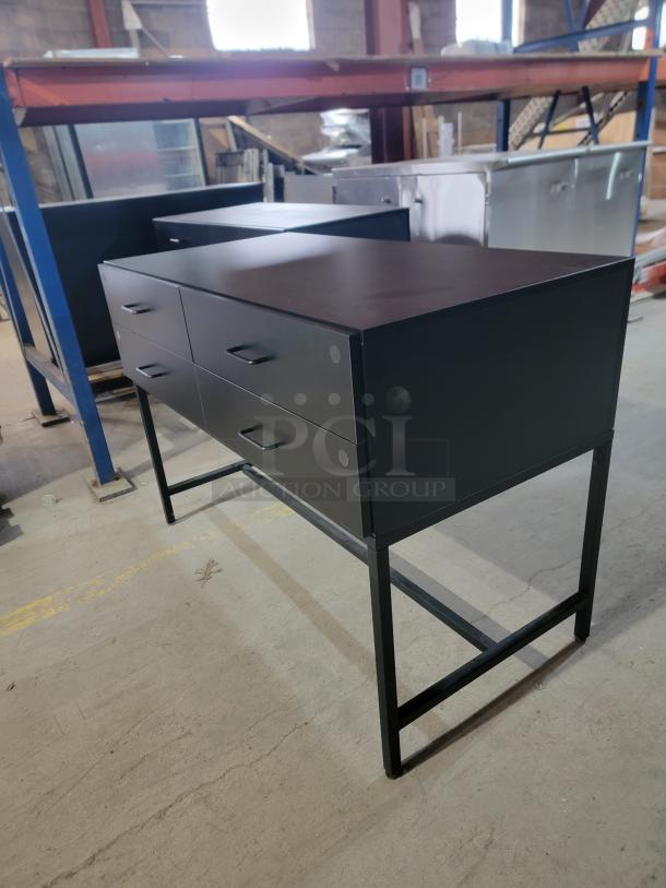 InterMetro magnetic locking 4-drawer industrial console; matte black, steel construction, magnetic key lock system.