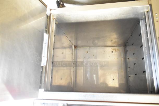 2019 Vulcan VBP5 heated holding cabinet, stainless steel interior, commercial casters, 120V, used condition.