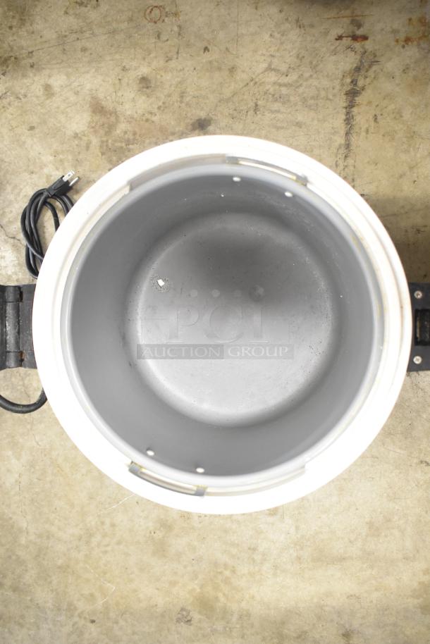 Thunder Group SEJ-22000 countertop rice warmer, 110-120V, 1 phase. Shows interior condition, used. Power cord visible.
