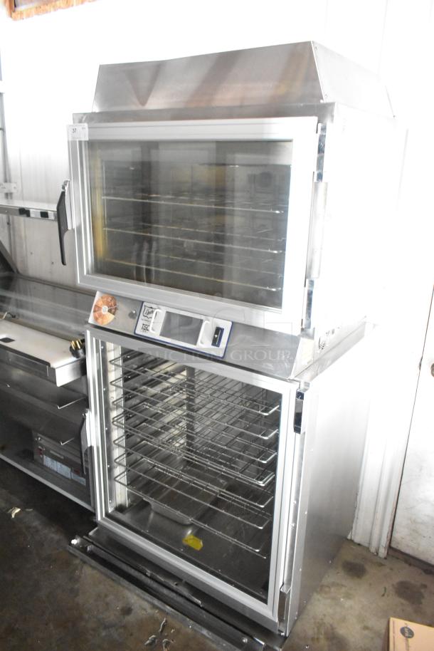 Duke TSC3-6/18 commercial oven proofer on casters, 208V, 3 phase. Stainless steel, dual doors, multiple racks, well-maintained.