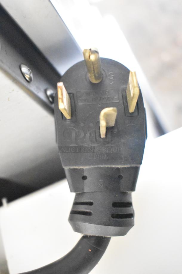 Duke TSC3-6/18 commercial oven proofer plug, 208V, 3-phase, close-up view showing connector design.