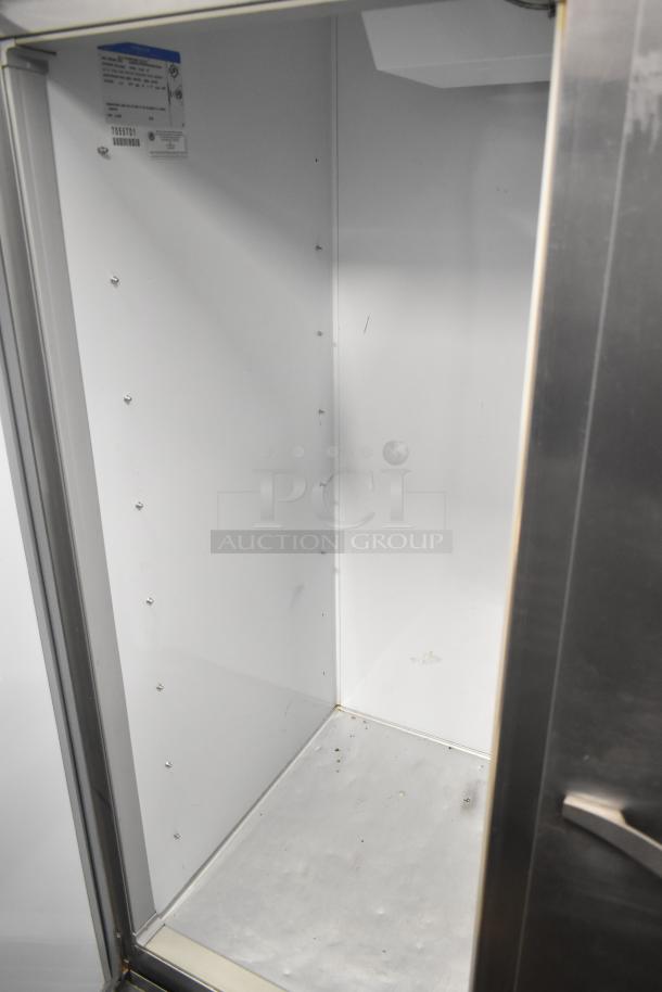 Beverage Air KR48-1AS commercial cooler interior, 2-door reach-in model, stainless steel finish, features 115 volts, 1 phase.