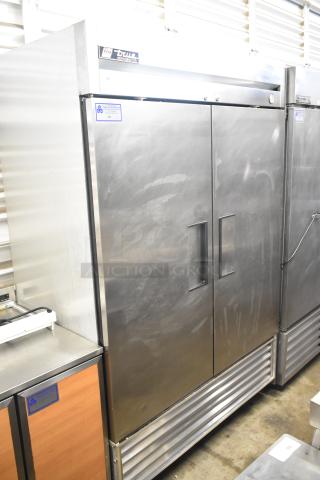 True T-49 Commercial 2 Door Reach-In Cooler, stainless steel, used condition. 115 volts, 1 phase. Model and brand labels visible.