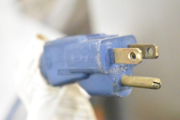 Close-up of a blue electrical plug for a True T-49 Commercial 2 Door Reach In Cooler, 115 Volts, 1 Phase.