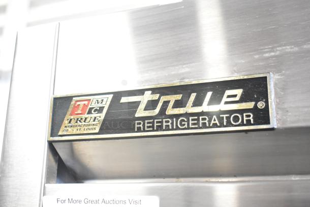 Close-up of the True T-49 commercial refrigerator label. Model T-49, made by True Manufacturing Co., St. Louis.