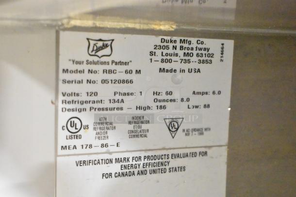 Duke RBC-60 M Commercial 2 Door Work Top Cooler label, 120V, 1 Phase, refrigerant 134A, UL listed, made in USA.