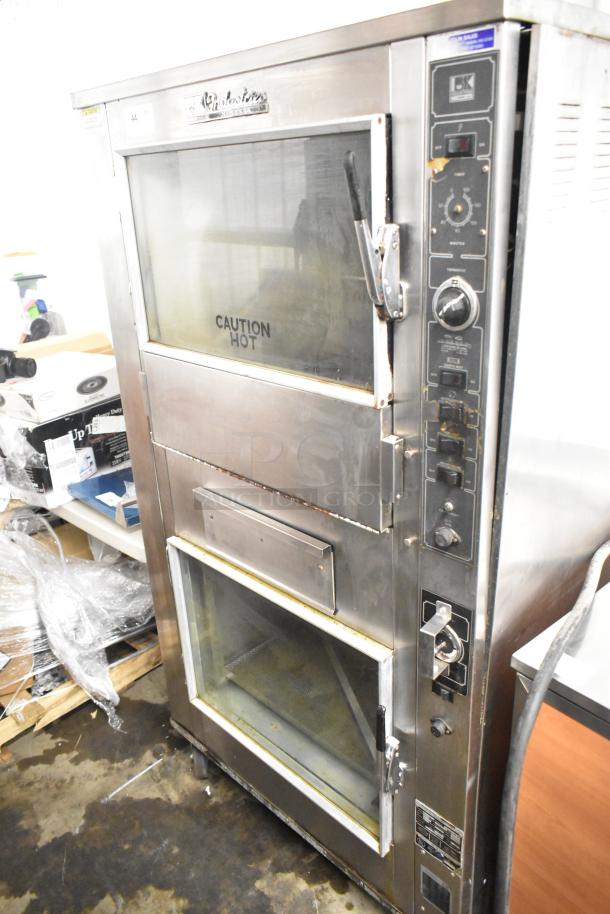 BK Industries SR commercial rotisserie oven with lower heated holding cabinet. Features 120/208 volts, 3 phase, on casters.
