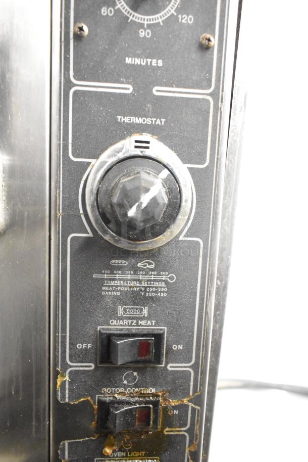 BK Industries SR rotisserie oven panel showing thermostat, quartz heat switch, rotor control, and temperature settings.