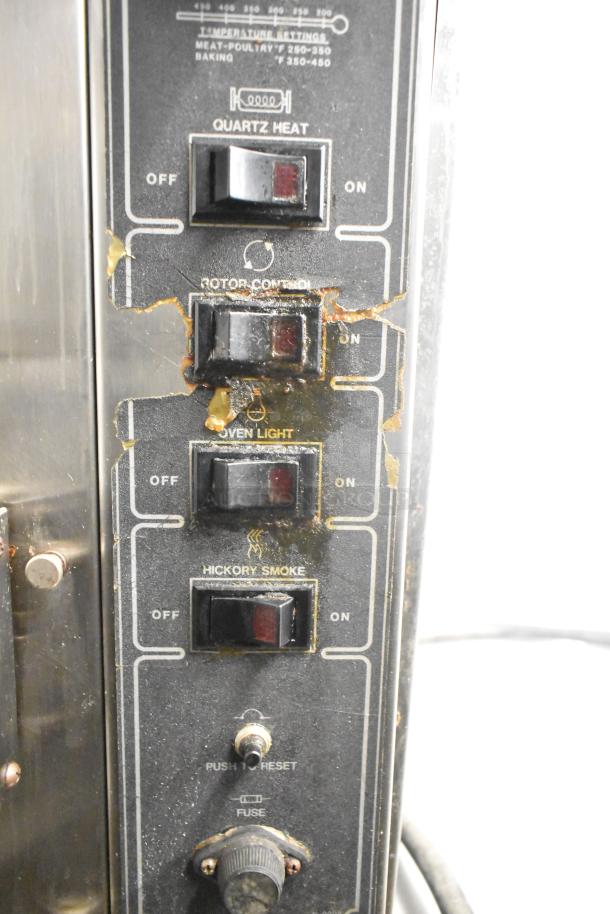 "BK Industries SR Rotisserie Oven controls; shows quartz heat, rotor control, oven light, hickory smoke switches."