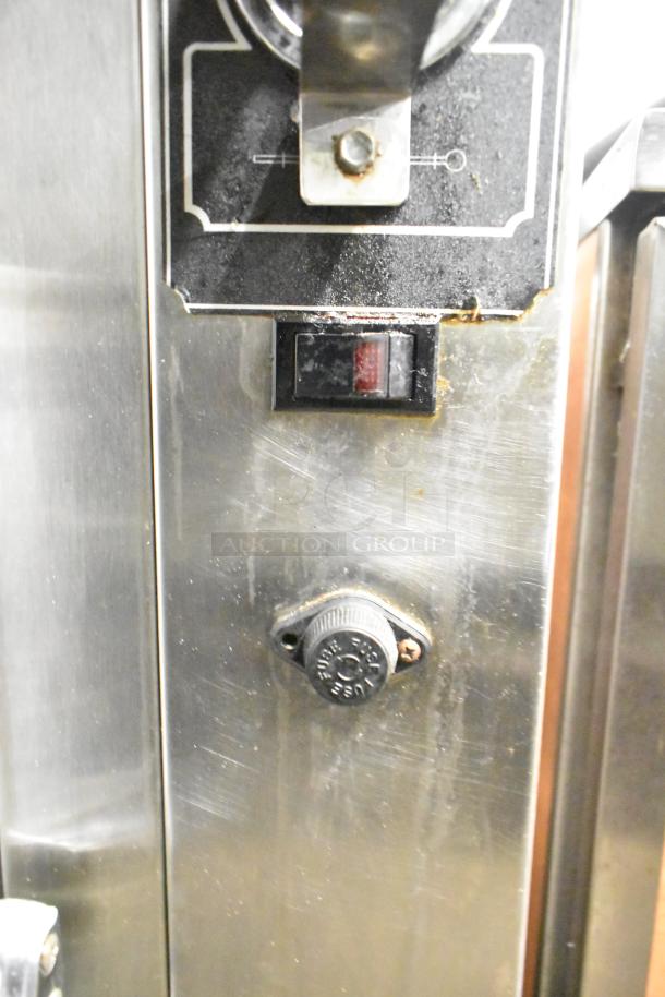 BK Industries SR Commercial Rotisserie Oven with lower heated cabinet, visible control panel, 120/208V, 3 Phase, on casters.