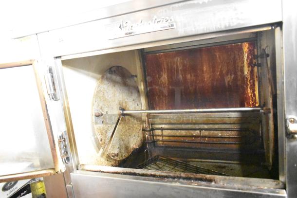 BK Industries SR commercial rotisserie oven with lower heated cabinet, stainless steel, on casters, 120/208V, 3-phase.