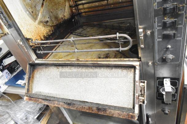 BK Industries SR Rotisserie Oven with heated cabinet, commercial casters, 120/208V, 3 phase, showing interior and control panel detail.