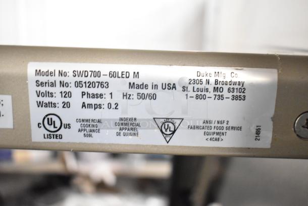Duke SWD700-60LED M label showing 120V, 1 Phase, serial 05120763, made in USA. UL listed cooking appliance.