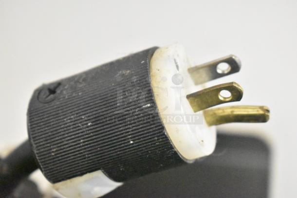 Close-up of a three-prong electrical plug for Duke SWD700-60LED M Commercial Prep Line, 120 Volts, 1 Phase.