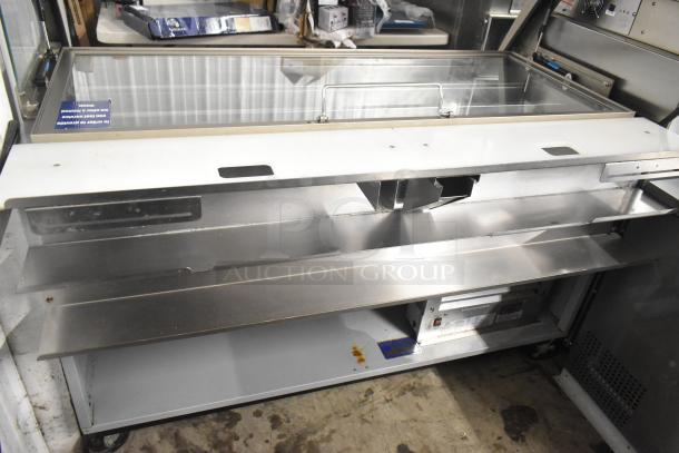 Duke SWD700-60LED M Subway Sandwich Prep Line with lowering sneeze guard, commercial casters, and 120V power.