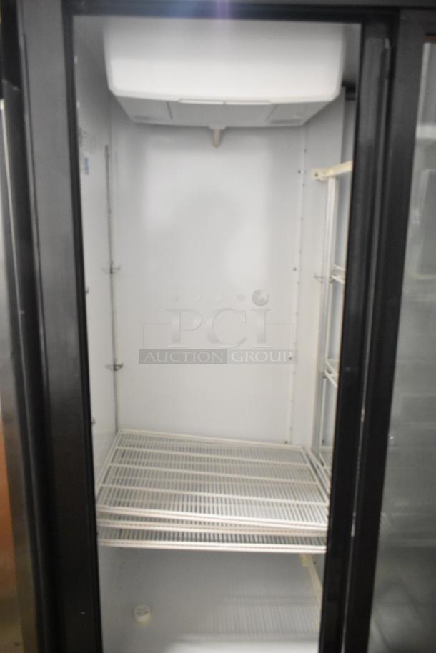 Beverage Air MT53-1-SD commercial 2-door reach-in cooler merchandiser, 115V, 1-phase, clean interior, sturdy wire shelves.