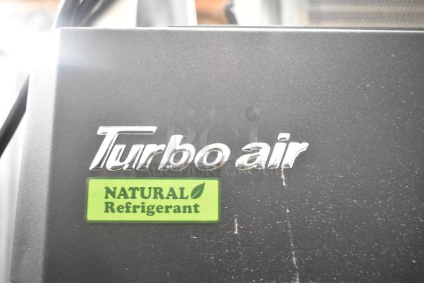 Turbo Air M3F24-1-N freezer logo and "Natural Refrigerant" label, highlighting eco-friendly design.