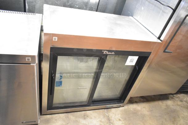 2021 True TSD-09G-HC-LD commercial back bar cooler, 2 glass doors, 115 volts, 1 phase, excellent condition, True branding.