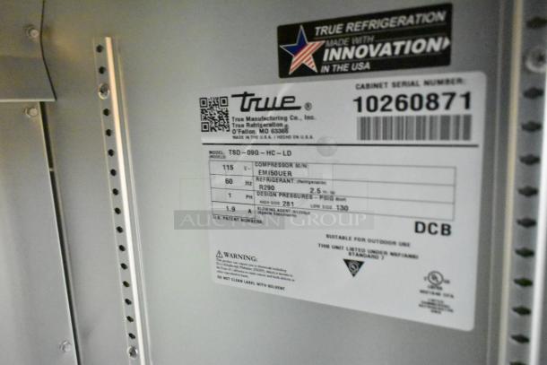 2021 True TSD-09G-HC-LD 2 Door Back Bar Cooler label, 115 volts, model details visible, commercial use.